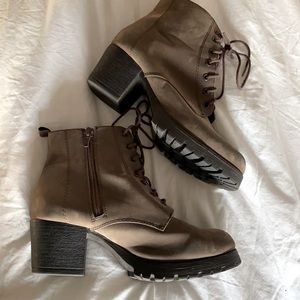 Lightly worn brown platform lace up boots